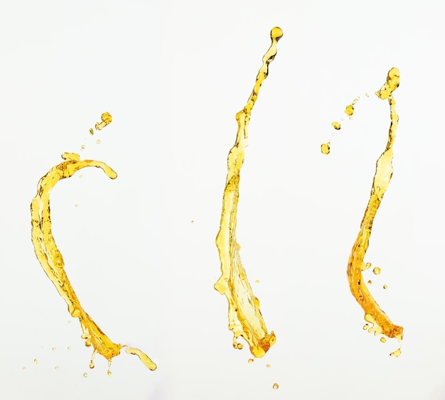 Appelsin- eller citronsaft eller olie, smøremiddelplask, flydende guld, gule drikkedråber. Frugtdrikkevand