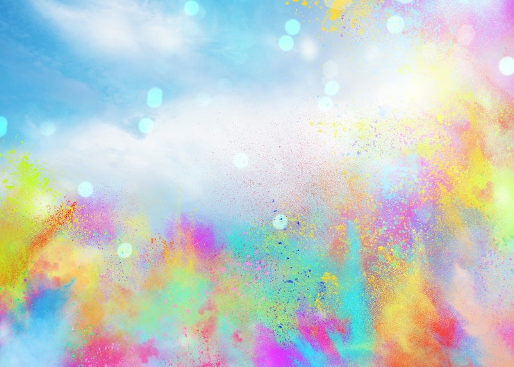 Bild background of explosion colored powders and glittering for spring holi color party