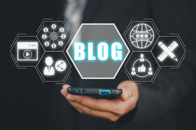 Blog concept Person using smart phone with blog icon on virtual screen