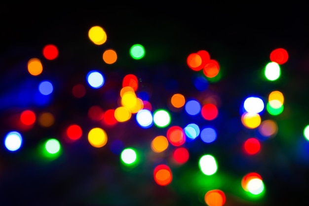 Blurred Christmas lights festive background.