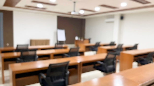 Blurred image of meeting room in the modern office ideal for presentation background