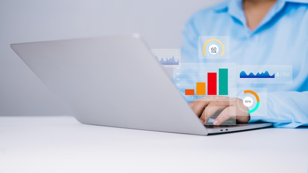 Business analytics with charts Financial and marketing strategy Business people use computers to analyze business and manage corporate data in office KPIs to improve organizational performance