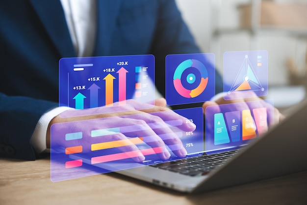 business finance and investment with a captivating data analysis concept businessman using laptop and tablet to analyze market data plan strategies and conduct market research