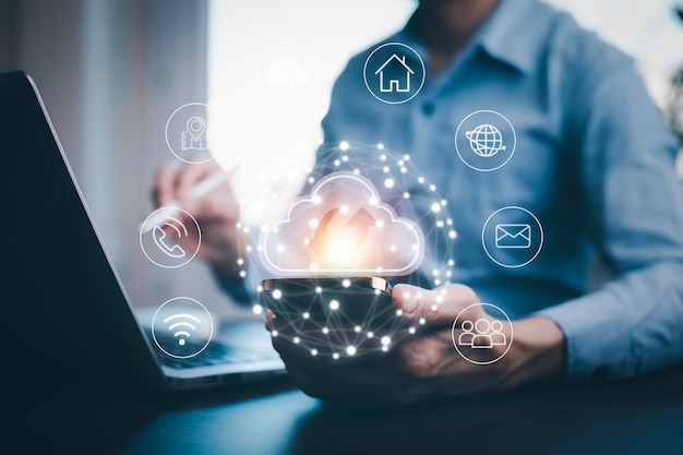 Business people using laptop with cloud computing system Storage and data transfer Cloud network Cloud technology Networking and internet service sharing download and upload and internet service