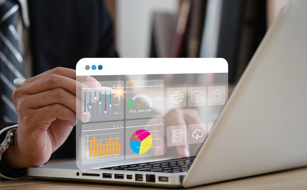 Business strategy concept for the development of the organization Businessman use laptops to work on virtual smart digital screens Analyze statistical Marketing dataData management