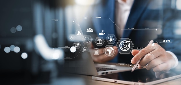 Businessman analyzing companys financial balance sheet working with digital augmented reality graphics Businessman calculates financial data for longterm investment