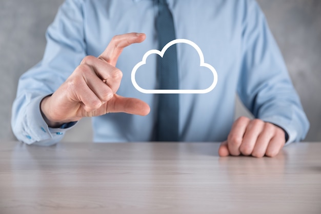 businessman hand holding cloud.cloud computing concept, close up of young business man with cloud over his hand.the concept of cloud service.