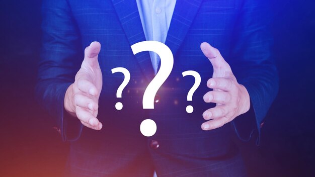 businessman hands show question marks confused thinking brainstorming or decision making concept problem solving finding answers