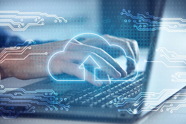 Businessman hands using laptop and cloud computing interface