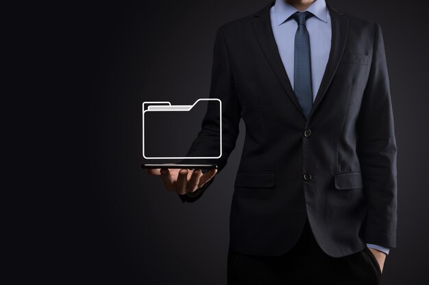 Businessman hold folder icon.Document Management System or DMS setup by IT consultant with modern
