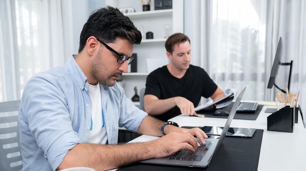 Businessman searching information to analyze business plan sellable