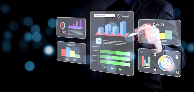 businessman using a laptop with analytics and data management systems analyst working in business analytics and data management systems to make reports and corporate strategy for finance operations