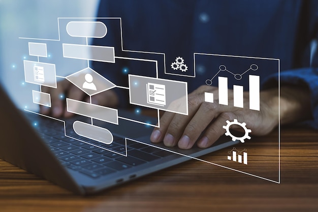 Businessman using workflow working on computer