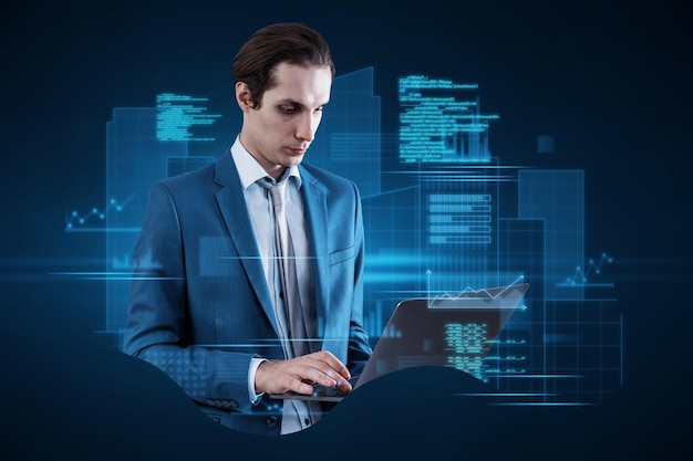 businessman working at a laptop programming a new program