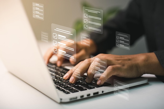 Businessmen use laptops to searching managing and access information in files online document database for efficient archiving and company data Document Management System DMS concept