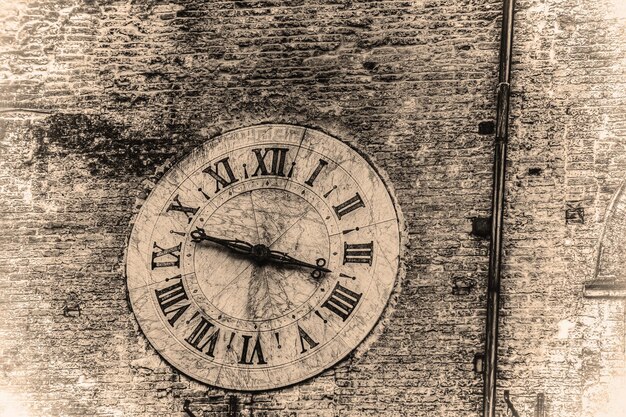 Clock on a wall in retro tone effect