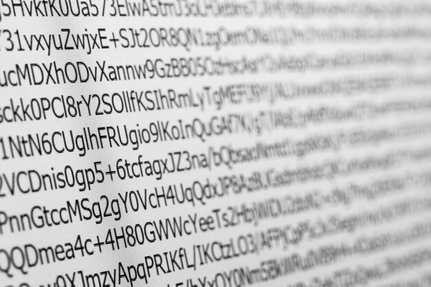 Close up macro shot selective focus of computer encoding screen. 