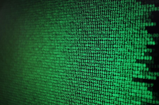 Close-up of binary code against black background