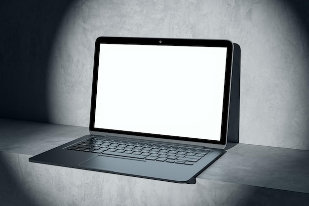 Close up of blank white computer in spotlight Mock up place on screen and advertisement concept 3D Rendering