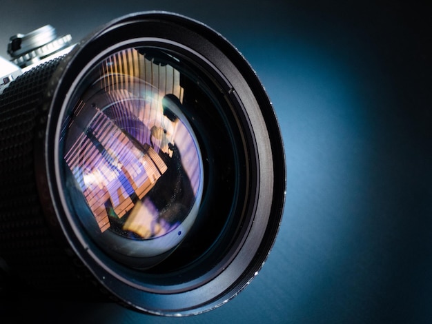 Close-up of camera lens on table