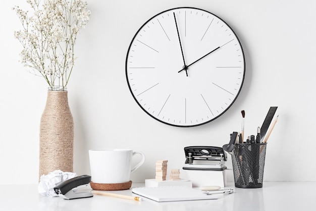 Close-up of clock on table at home