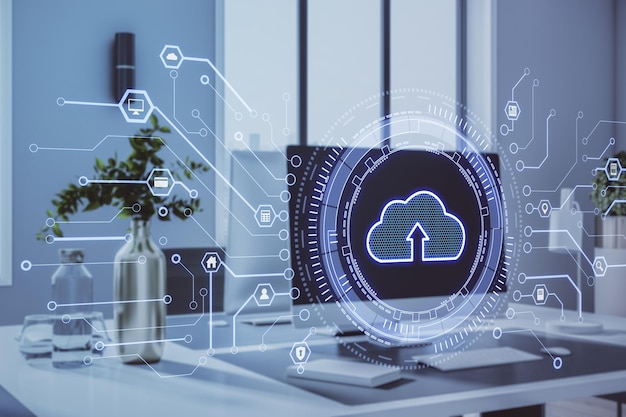 Close up of creative office desktop with glowing cloud interface on burry background Cloud computing and technology concept Double exposure