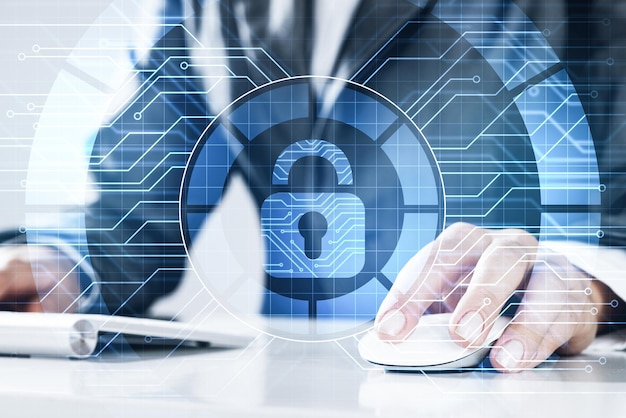 Close up of female hands using computer keyboard and lock icon on screen
