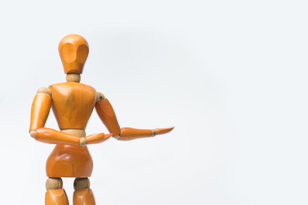 Close-up of figurine against white background
