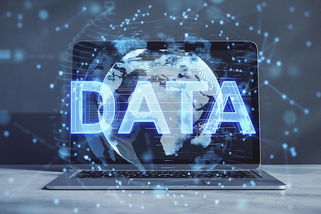 close up of laptop with creative polygonal globe with web hologram on blurry background technology internet and innovation concept double exposure