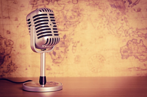 Close-up of microphone on wooden table