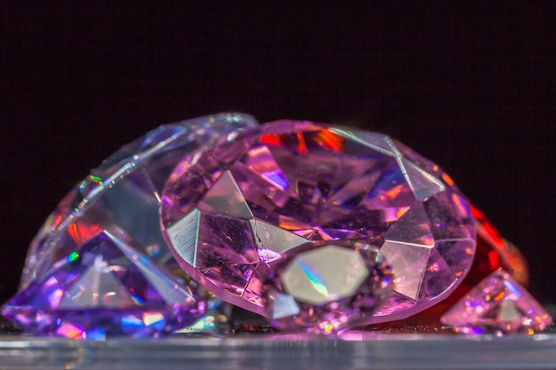 Close-up of multi colored gemstones on table