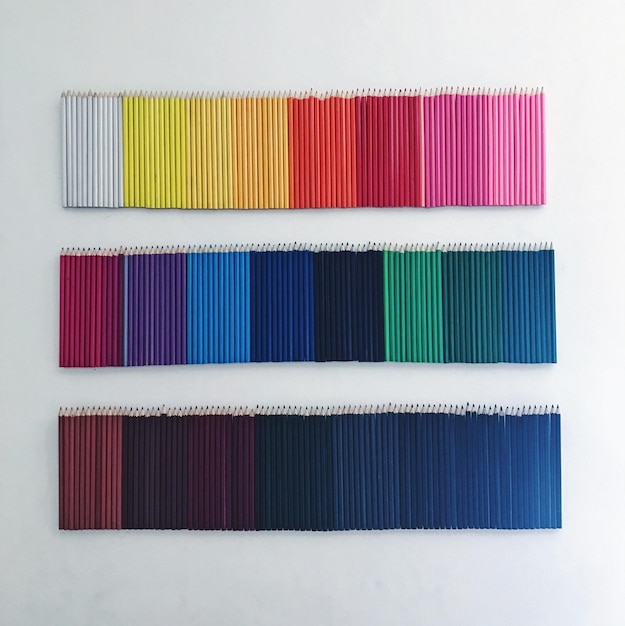 close-up of multi colored pencils in row