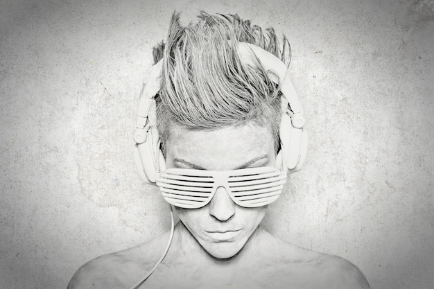 close-up of woman wearing novelty glasses and headphones