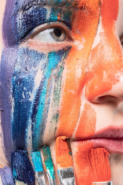 Close-up of young woman with painted face