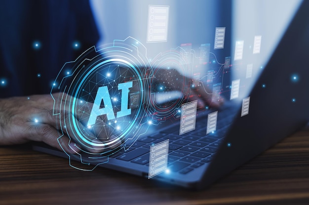 Closeup hand using computer laptop with futuristic digital interface displaying AI technology symbolizing the integration of artificial intelligence in modern business solutions