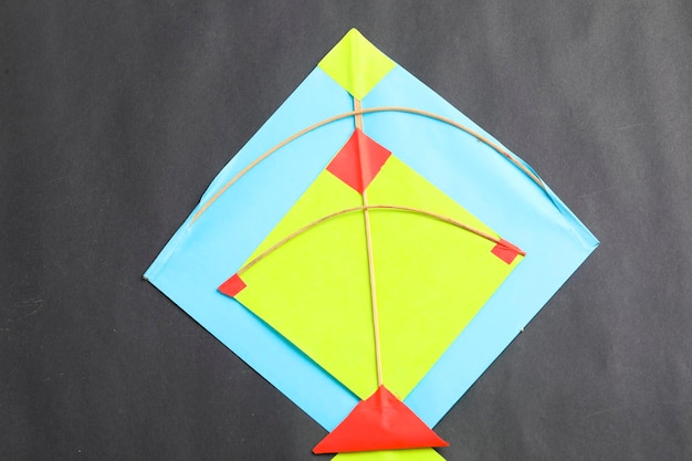 Colorful paper kites and string , Makar Sankranti festival Concept.