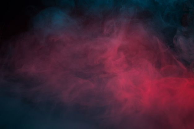 Colorful smoke on a black background closeup