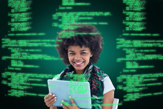 Composite image of happy woman using tablet