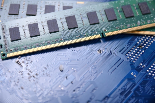Computer memory RAM on motherboard background . Close up. system, main memory, random access memory, onboard, computer detail. Computer components . DDR3. DDR4. DDR5