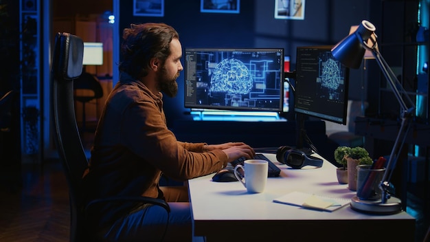 Computer scientist writes code on PC to visualize AI neural networks