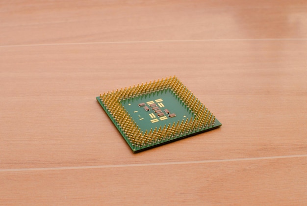 cpu central processor unit computer chip on motherboard closeup cpu desktop with pc facing contacts