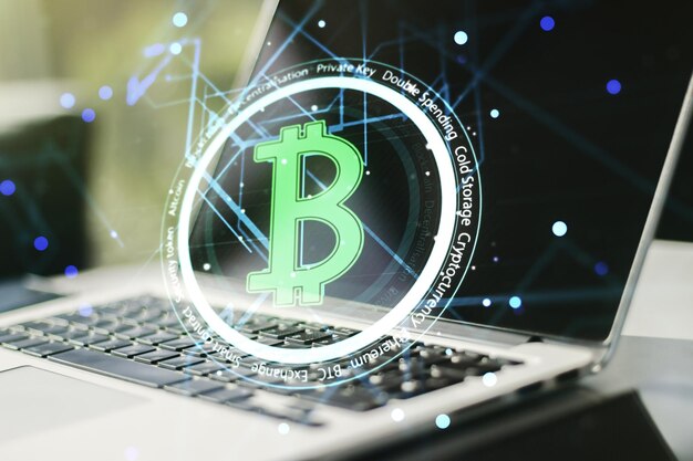 Creative Bitcoin concept with modern laptop background Multiexposure