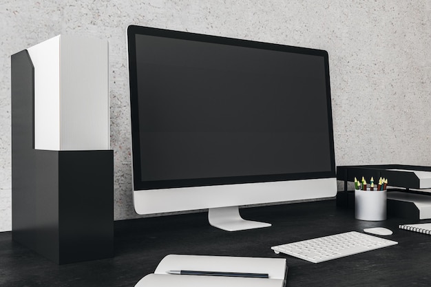 Creative designer desk with empty computer screen and other items Mock up 3D Rendering