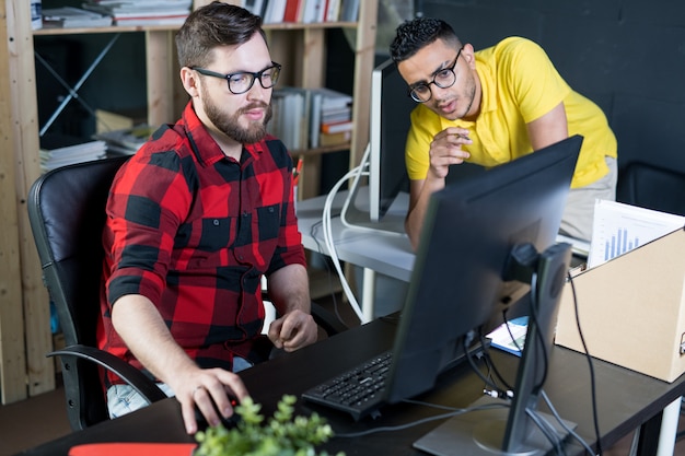 Creative Young IT Developer Using Computer
