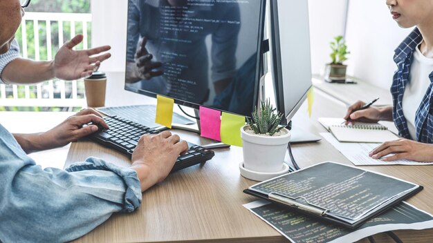Cropped image of business people working in office