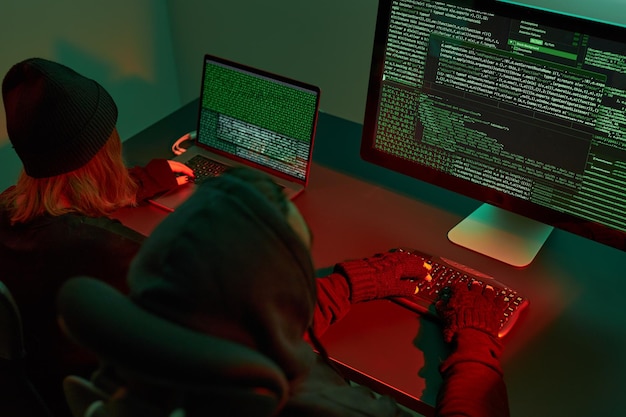 Cyber attack hackers breaking security anonymous people access secret data cyber war programming