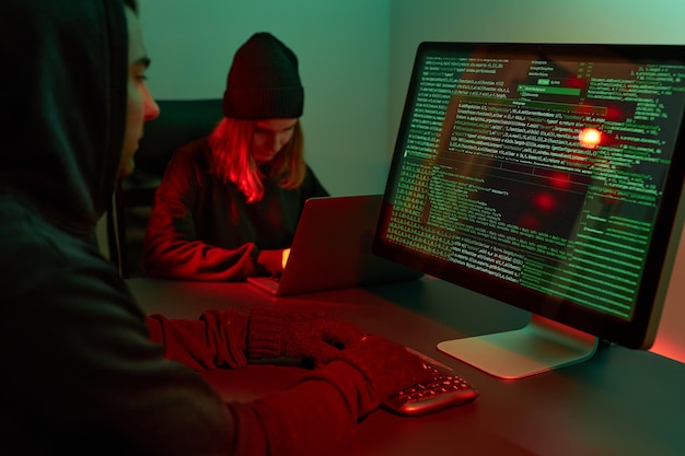 Cyber attack hackers breaking security anonymous people access sensitive data cyber war coding