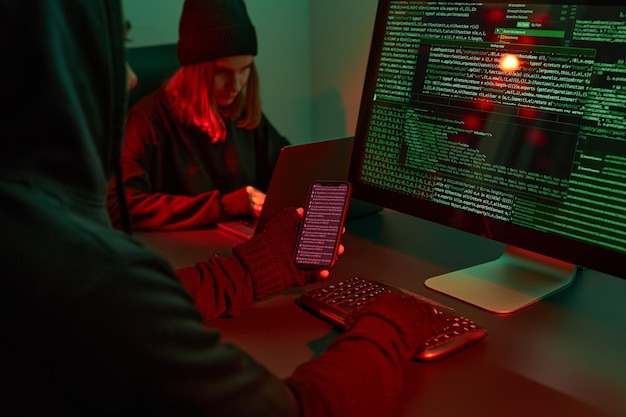 Cyber war hackers breaking security anonymous people access secret data cyber attack typing code