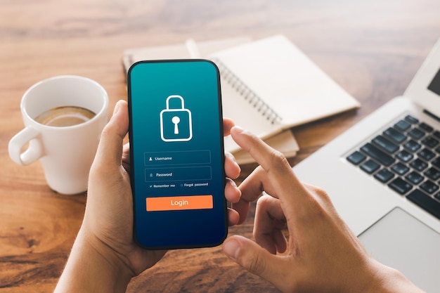 Cybersecurity internet and networking concept Close up of hand holding smartphone information security and encryption secure access to users personal information secure Internet access