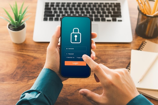 Cybersecurity internet and networking concept Close up of hand holding smartphone information security and encryption secure access to users personal information secure Internet access